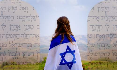 Israeli woman standing between two Hebrew tablets