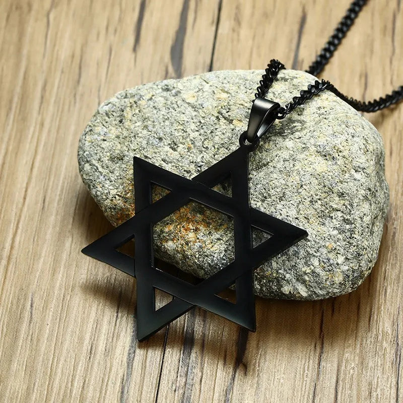 Classic Star of David Pendant Necklace on a rock