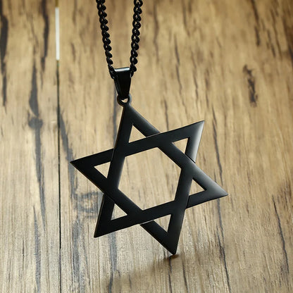 Classic Star of David Pendant Necklace on a desk